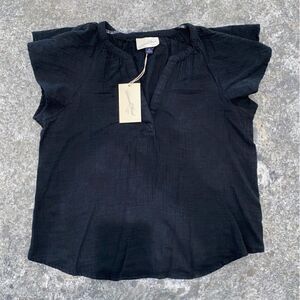 Women’s blouse with fun shoulders!